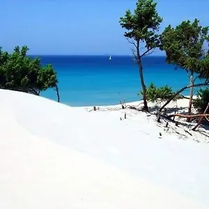 Проживание в семье Villa Piscinas Пишинас
